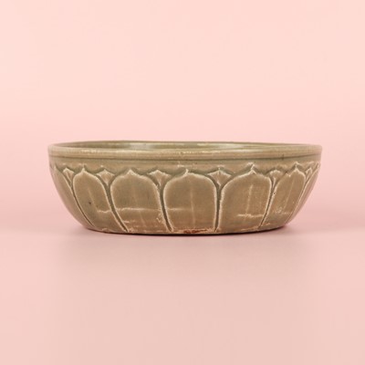 Lot 11 - A Chinese Yue celadon 'lotus' washer, Song dynasty