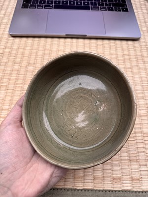 Lot 11 - A Chinese Yue celadon 'lotus' washer, Song dynasty