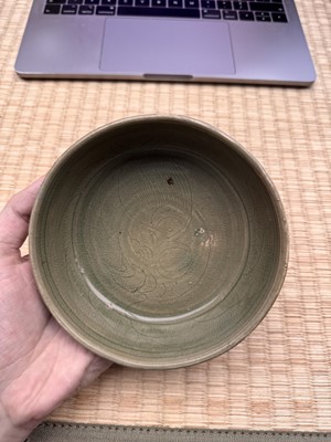 Lot 11 - A Chinese Yue celadon 'lotus' washer, Song dynasty