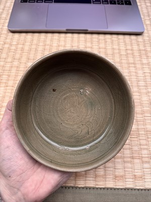 Lot 11 - A Chinese Yue celadon 'lotus' washer, Song dynasty