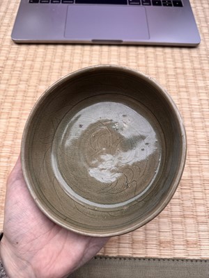 Lot 11 - A Chinese Yue celadon 'lotus' washer, Song dynasty