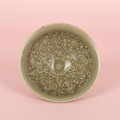 Lot 32 - A Chinese Yaozhou celadon 'chrysanthemum' moulded bowl, Northern Song dynasty