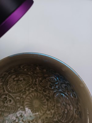 Lot 32 - A Chinese Yaozhou celadon 'chrysanthemum' moulded bowl, Northern Song dynasty