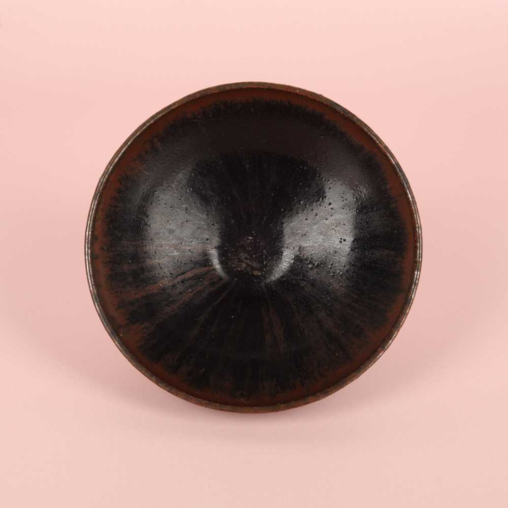 Lot 477 - A Chinese Cizhou black-glazed bowl, Song - Jin dynasty