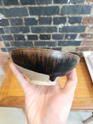 Lot 477 - A Chinese Cizhou black-glazed bowl, Song - Jin dynasty