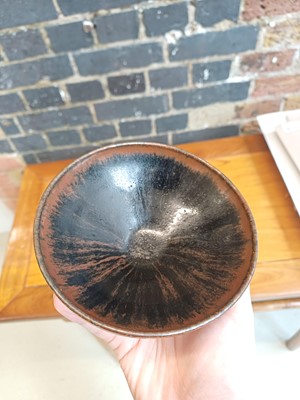 Lot 477 - A Chinese Cizhou black-glazed bowl, Song - Jin dynasty