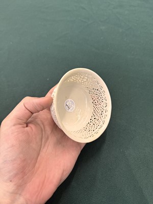 Lot 27 - A fine Chinese white-glazed 'linglong' reticulated bowl, Ming dynasty, Chongzhen period