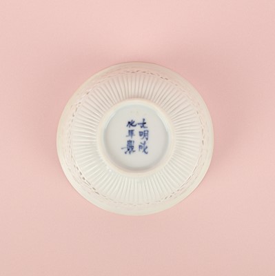 Lot 27 - A fine Chinese white-glazed 'linglong' reticulated bowl, Ming dynasty, Chongzhen period