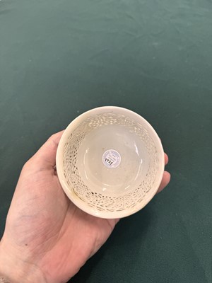 Lot 27 - A fine Chinese white-glazed 'linglong' reticulated bowl, Ming dynasty, Chongzhen period