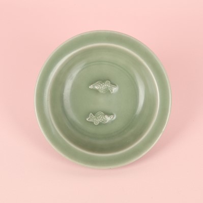 Lot 26 - A Chinese Longquan celadon 'twin fish' moulded dish, Song dynasty