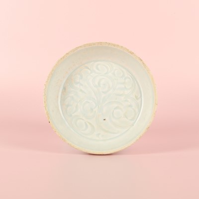 Lot 12 - A Chinese Qingbai 'lotus' carved dish, Southern Song dynasty