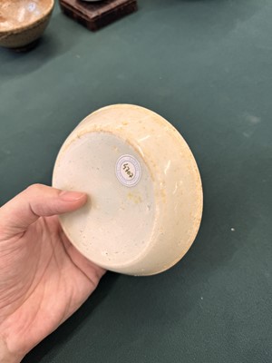 Lot 12 - A Chinese Qingbai 'lotus' carved dish, Southern Song dynasty