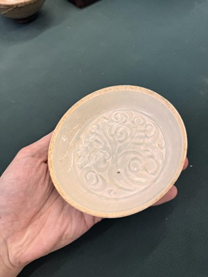 Lot 12 - A Chinese Qingbai 'lotus' carved dish, Southern Song dynasty