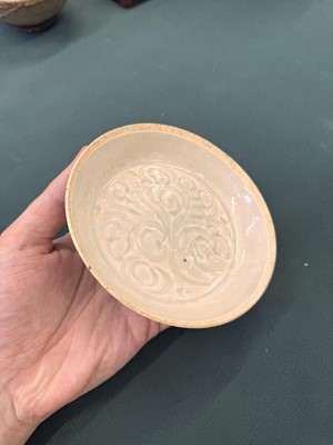 Lot 12 - A Chinese Qingbai 'lotus' carved dish, Southern Song dynasty