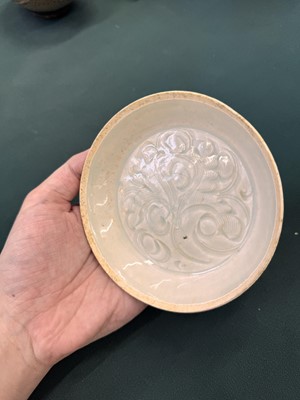 Lot 12 - A Chinese Qingbai 'lotus' carved dish, Southern Song dynasty