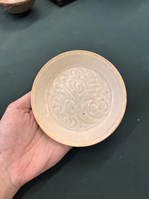 Lot 12 - A Chinese Qingbai 'lotus' carved dish, Southern Song dynasty
