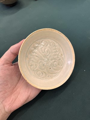 Lot 12 - A Chinese Qingbai 'lotus' carved dish, Southern Song dynasty