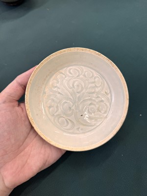 Lot 12 - A Chinese Qingbai 'lotus' carved dish, Southern Song dynasty