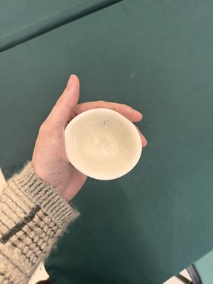 Lot 6 - A Chinese Dehua 'prunus' libation cup, Qing dynasty