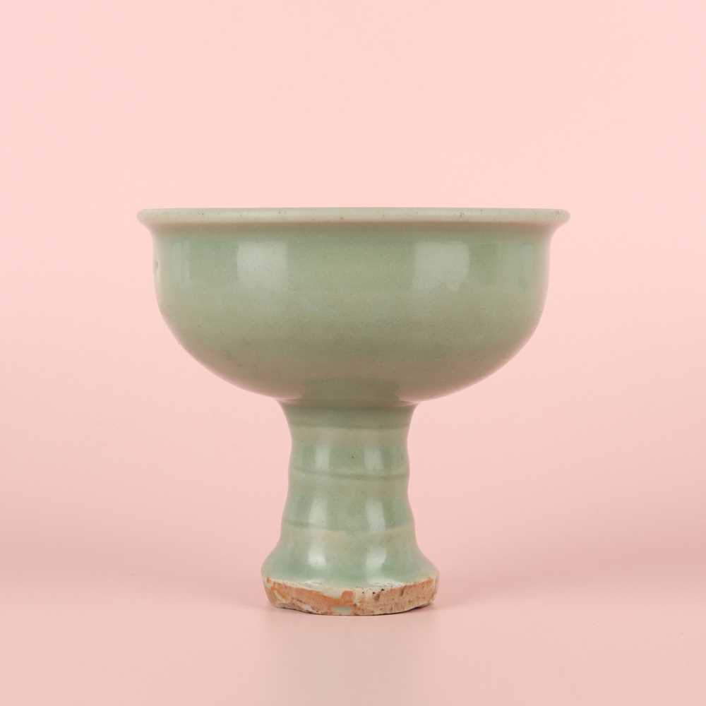 Lot 28 - A Chinese Longquan celadon stem cup / bowl, Yuan - Early Ming dynasty