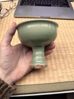 Lot 28 - A Chinese Longquan celadon stem cup / bowl, Yuan - Early Ming dynasty