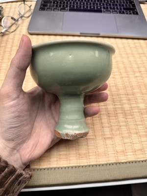 Lot 28 - A Chinese Longquan celadon stem cup / bowl, Yuan - Early Ming dynasty