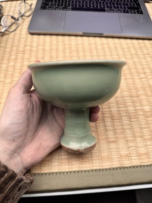 Lot 28 - A Chinese Longquan celadon stem cup / bowl, Yuan - Early Ming dynasty