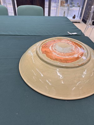 Lot 485 - A large Chinese Longquan celadon 'peony' charger, Ming Dynasty