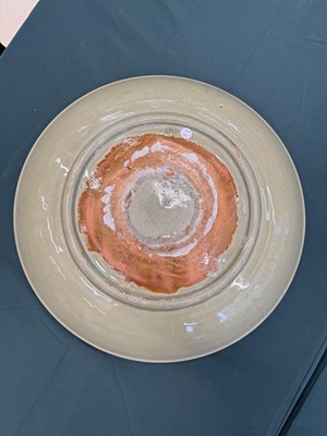 Lot 485 - A large Chinese Longquan celadon 'peony' charger, Ming Dynasty
