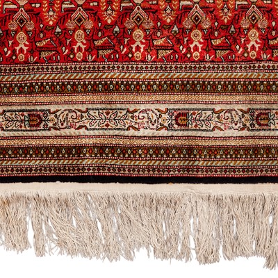 Lot 76 - An extremely fine silk Qum carpet, central Persia