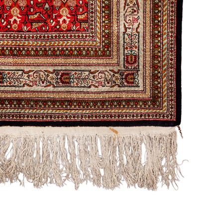 Lot 76 - An extremely fine silk Qum carpet, central Persia
