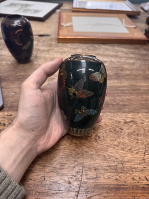 Lot 94 - A pair of Japanese cloisonné 'butterfly' vases, Meiji period
