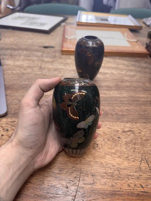 Lot 94 - A pair of Japanese cloisonné 'butterfly' vases, Meiji period
