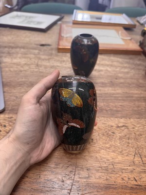 Lot 94 - A pair of Japanese cloisonné 'butterfly' vases, Meiji period