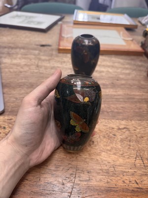 Lot 94 - A pair of Japanese cloisonné 'butterfly' vases, Meiji period