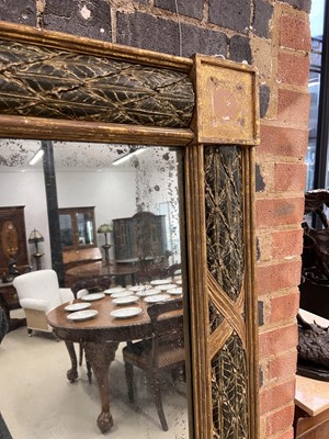 Lot 58 - A large Regency giltwood and painted wall mirror