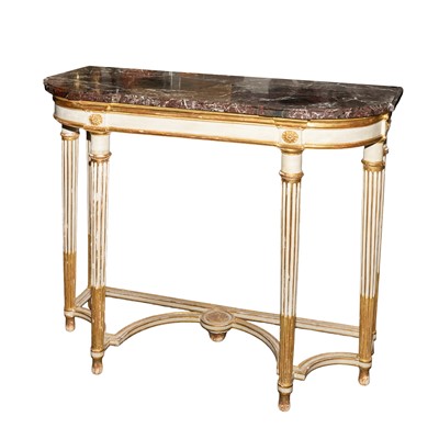 Lot 24 - A Louis XVI marble topped white painted and parcel gilt console table