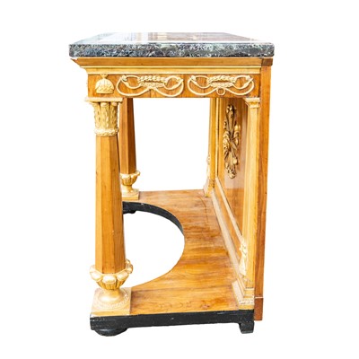 Lot 23 - A French Empire period marble topped walnut and parcel gilt console table