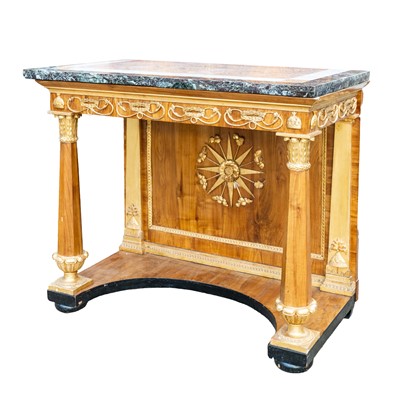 Lot 23 - A French Empire period marble topped walnut and parcel gilt console table