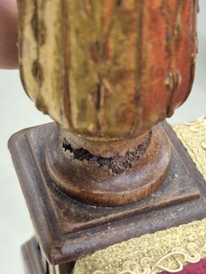 Lot 9 - A pair of French Empire walnut and parcel gilt X-frame stools