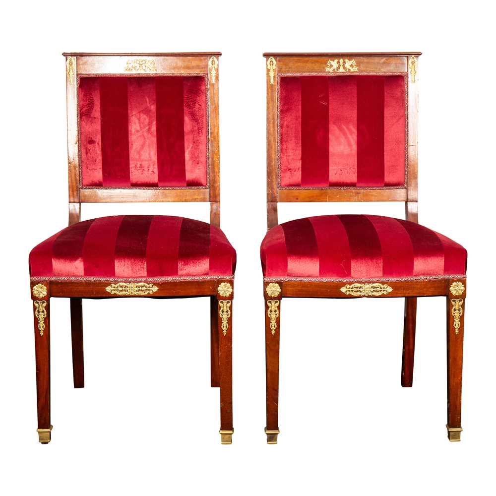 Lot 24 - A pair of Empire style mahogany side chairs