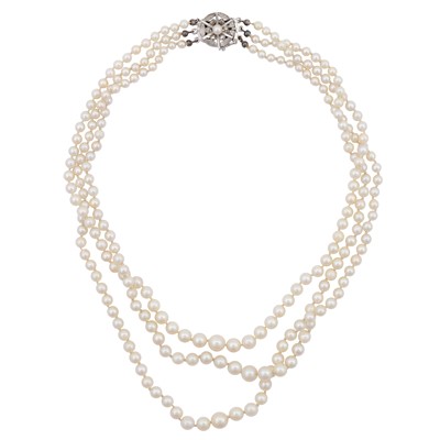 Lot 52 - A three strand pearl necklace