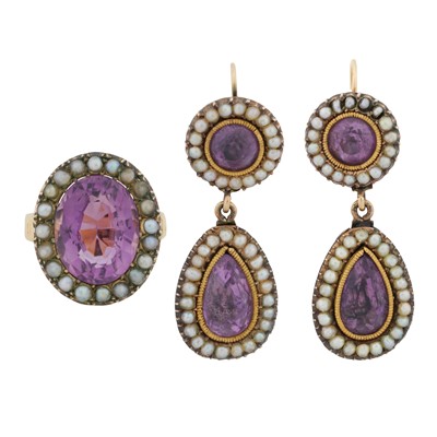 Lot 284 - A pair of amethyst and seed pearl ring and earring suite, circa 1933