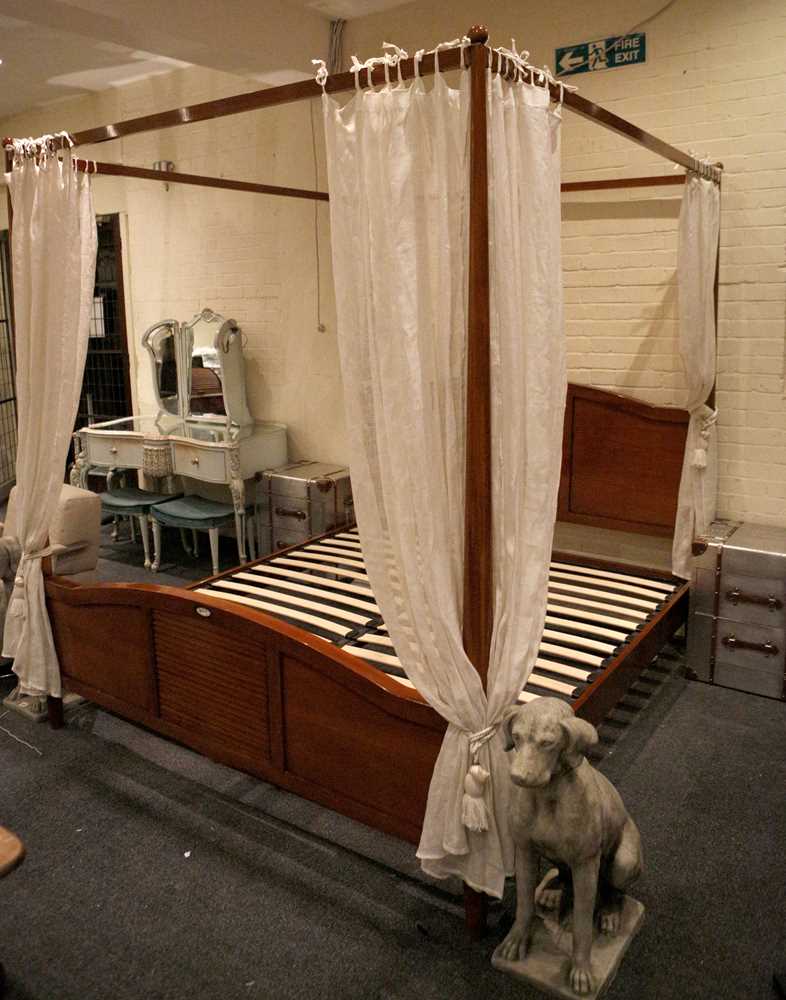 Lot 817 - A contemporary four poster bed, continental...