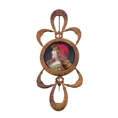 Lot 78 - A portrait miniature brooch in a leather case