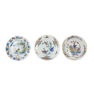 Lot 192 - Three Dutch Delft polychrome plates, 18th century
