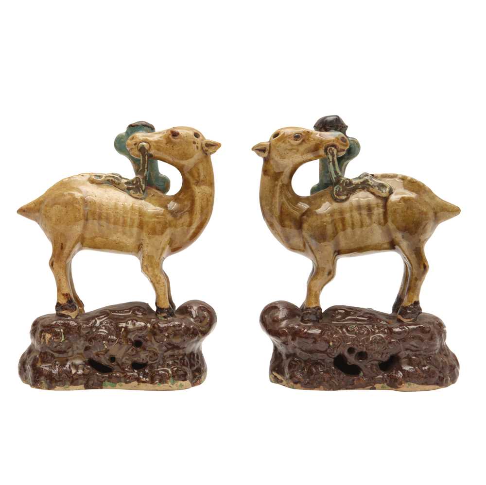 Lot 55 - A pair of Chinese sancai-glazed 'deer and lingzhi' figures, Qing dynasty, 19th century