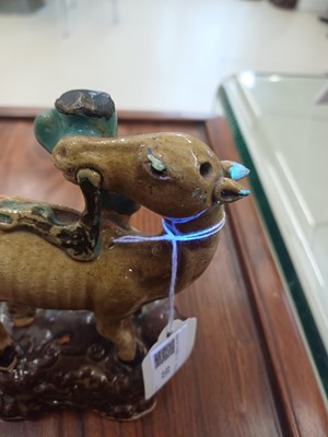Lot 55 - A pair of Chinese sancai-glazed 'deer and lingzhi' figures, Qing dynasty, 19th century