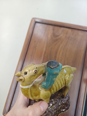 Lot 55 - A pair of Chinese sancai-glazed 'deer and lingzhi' figures, Qing dynasty, 19th century