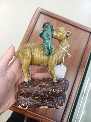 Lot 55 - A pair of Chinese sancai-glazed 'deer and lingzhi' figures, Qing dynasty, 19th century